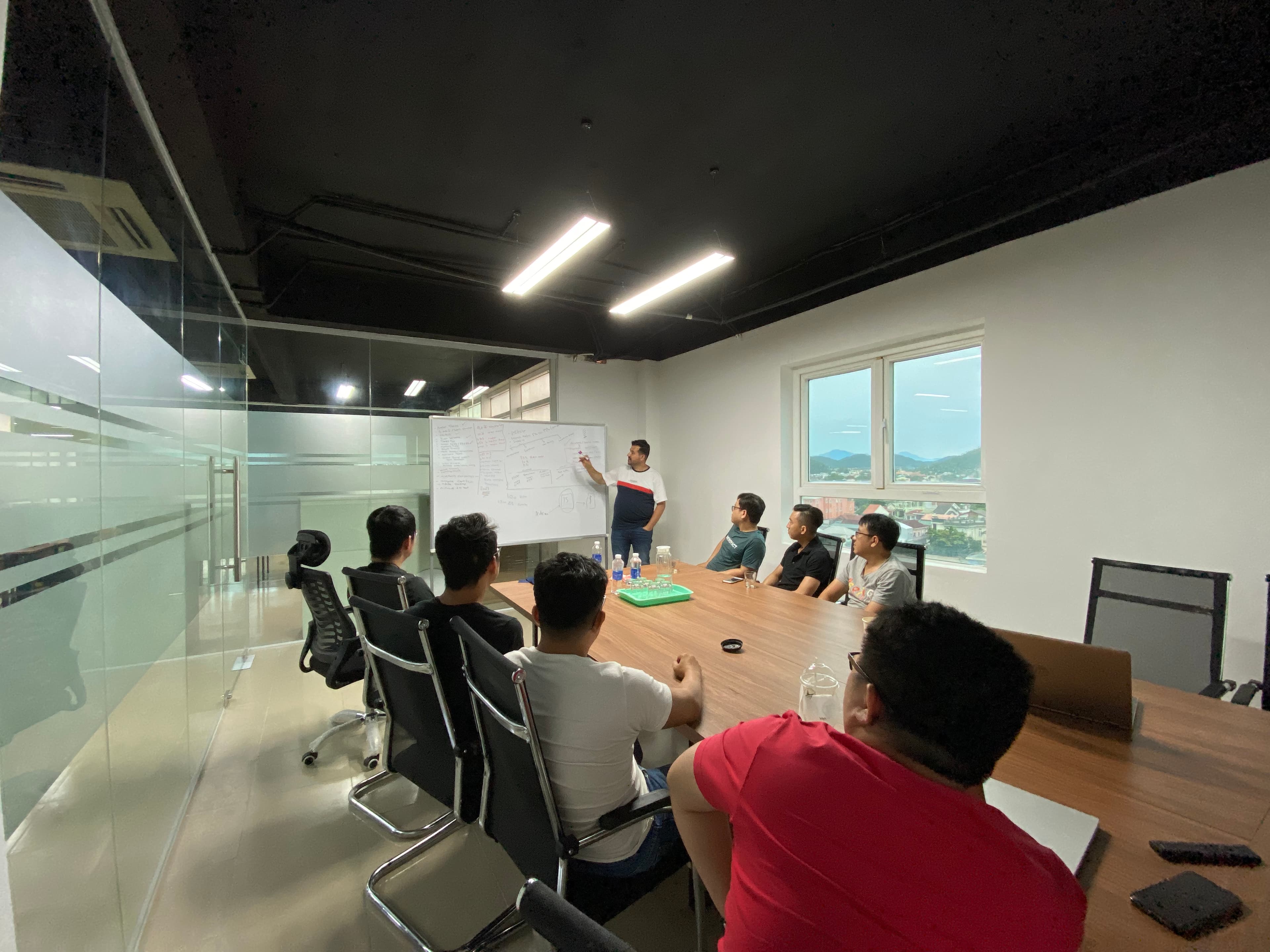 SnapTec engineers and strategists working through a technical plan together